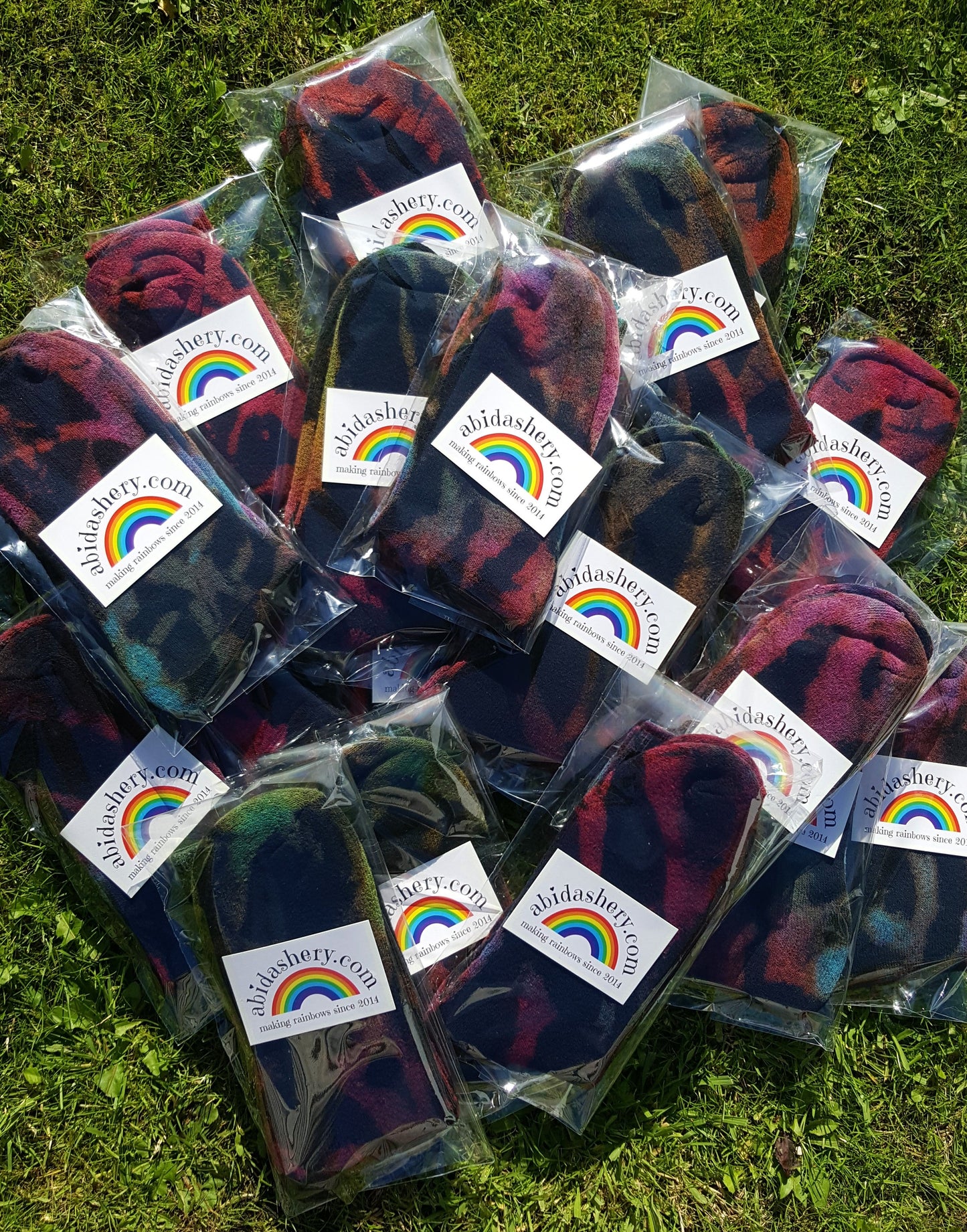 x1 pair of hand bleached & tie dyed sports socks. Get hippy trippy every day of the week with these awesome men's/unisex tie dye sports socks. Socks are available in a mixture of colours and one will be chosen at random for your order. Each pair is hand dyed with love and is special and unique. In 100% cotton, thick warm socks in stretchy cotton fabric. To fit men's size UK 6-9 / 9-12