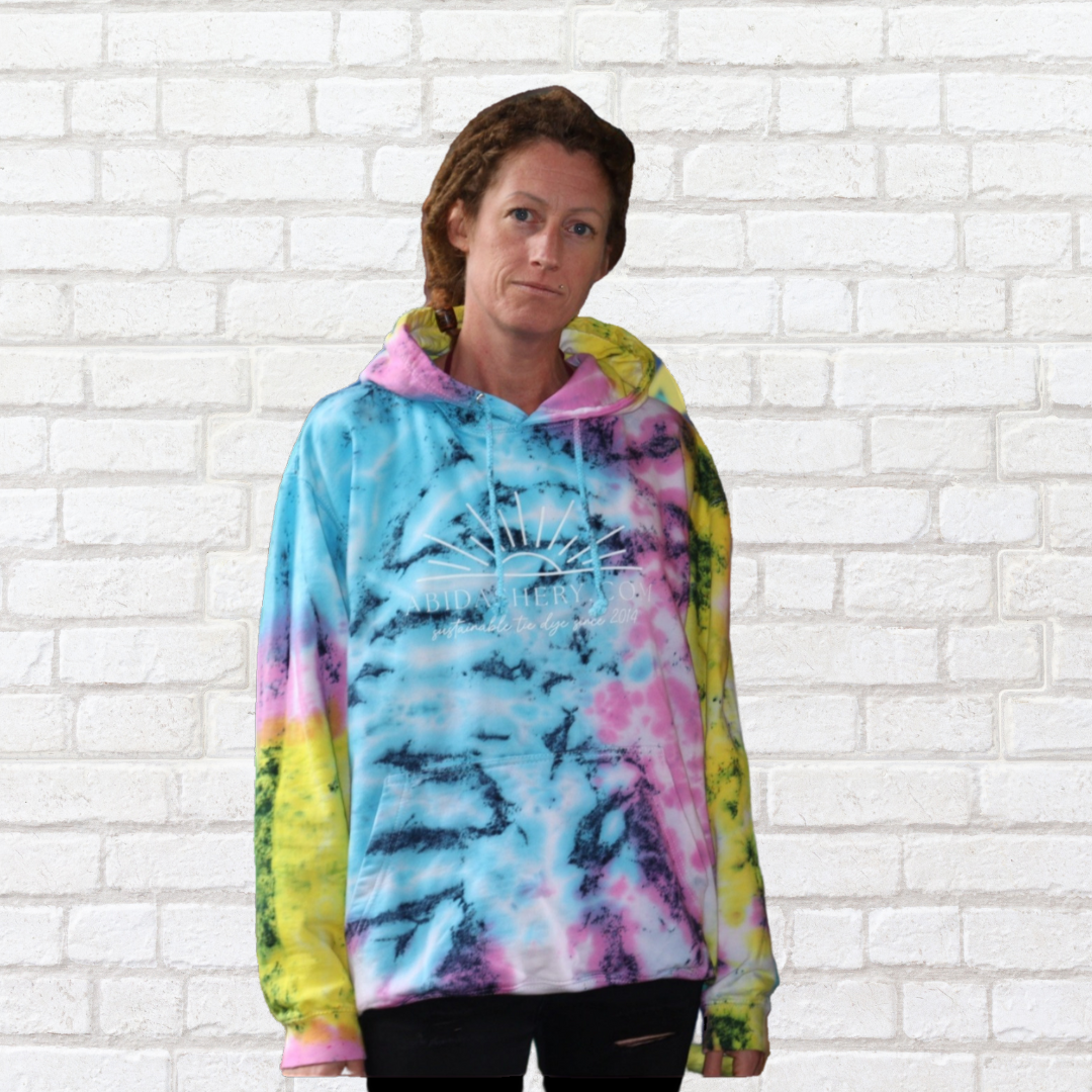 Take a risk and stand out from the summer festival crowds with our exclusive ethical scrunch tie dye hoodie!
Made from organic cotton, this hoodie boasts our most popular tie dye colourway in pink, blue, and yellow.