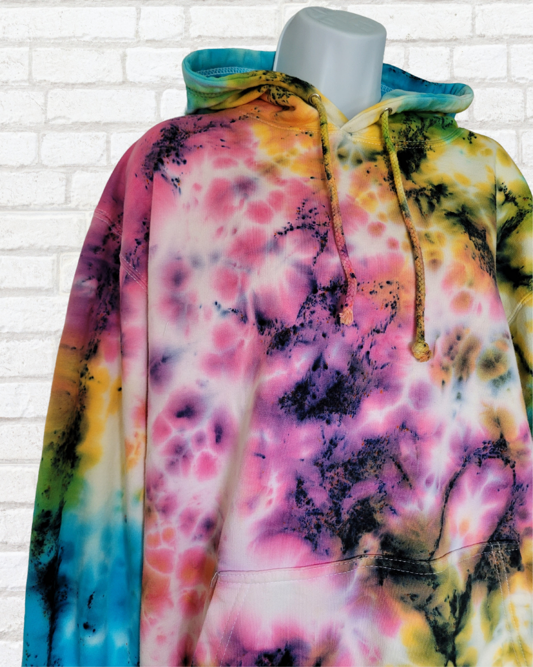 Take a risk and stand out from the summer festival crowds with our exclusive ethical scrunch tie dye hoodie!
Made from organic cotton, this hoodie boasts our most popular tie dye colourway in pink, blue, and yellow.