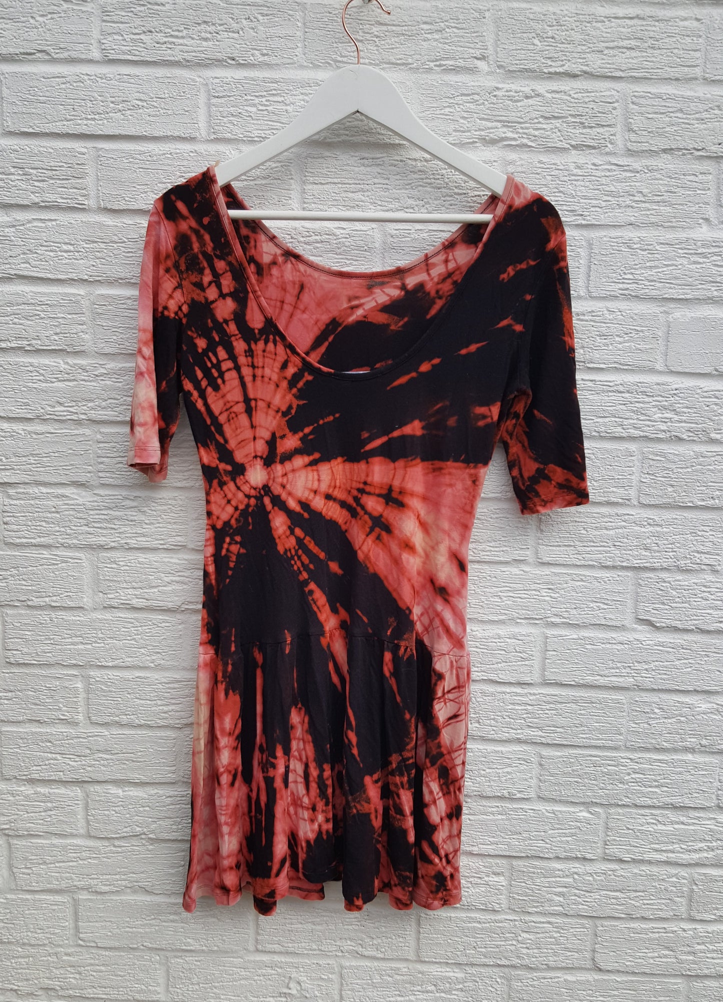 Bleached Shibori style tie dye dress in black & peach shades, jersey fabric mini dress with short sleeves and low back, to fit UK Size 10 or US size 6. This beautiful one of a kind dress was thrifted and upcycled in the UK, so it's not just one of a kind! It's also sustainable & friendly to the environment too! Hand dyed with love by AbiDashery. BE QUICK - THIS IS A ONE OFF UPCYCLE & THERE'S ONLY ONE AVAILABLE!