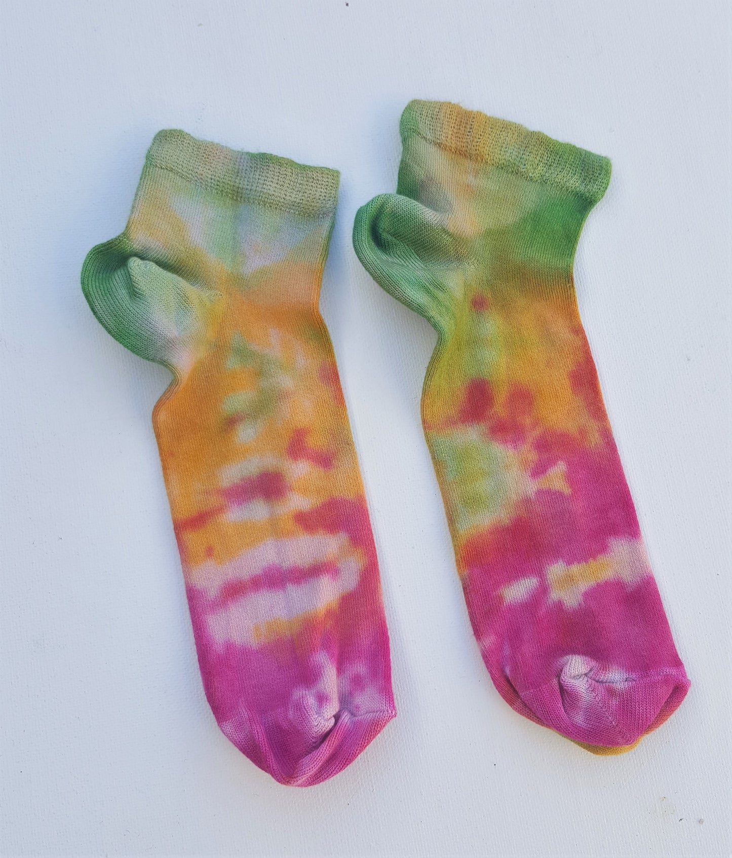 One pair of hand dyed bamboo trainer socks, in ice tie dye colours. Each is pair is unique and hand dyed with love, there's a huge variety of colours available and a pair will be chosen at random for you, each pair is unique and hand dyed! Made with natural organic bamboo fibres, light and breathable. 80% bamboo, 17% polyamide, 3% elastane . To fit women's size UK 4-8 - EUR 37-42 - US 6-10