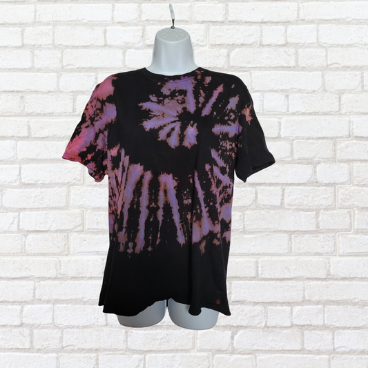 AbiDashery black and purple tie-dye t-shirt on a mannequin against a white wall — Third Eye Chakra Collection
