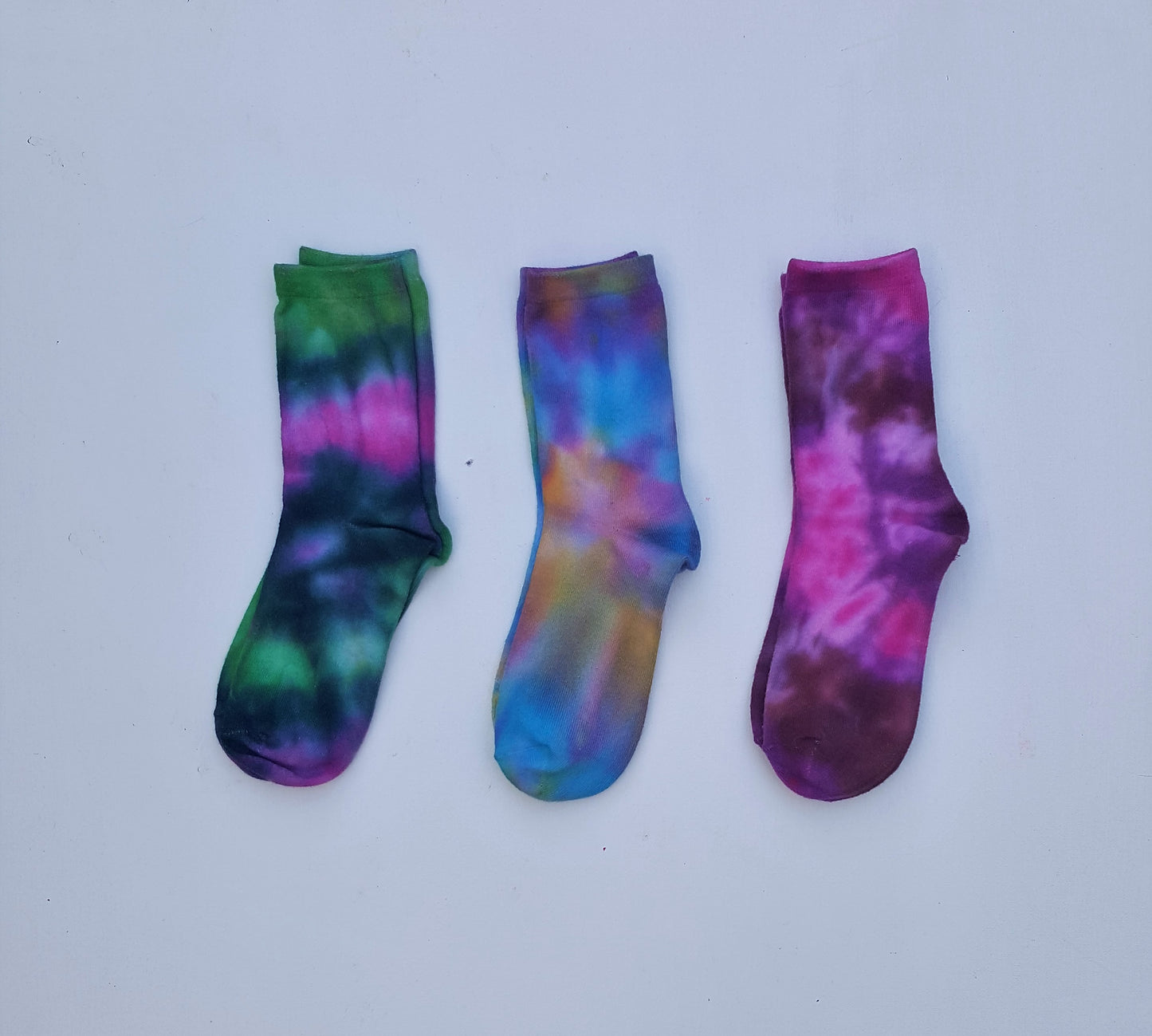 Tie dye socks for women. Gift set of 3 pairs of tie dye socks, packs will each contain x3 pairs of tie dye socks in a mixture of colours and may not be the same as socks shown, however each pair is hand dyed with love and each pair is special and unique.