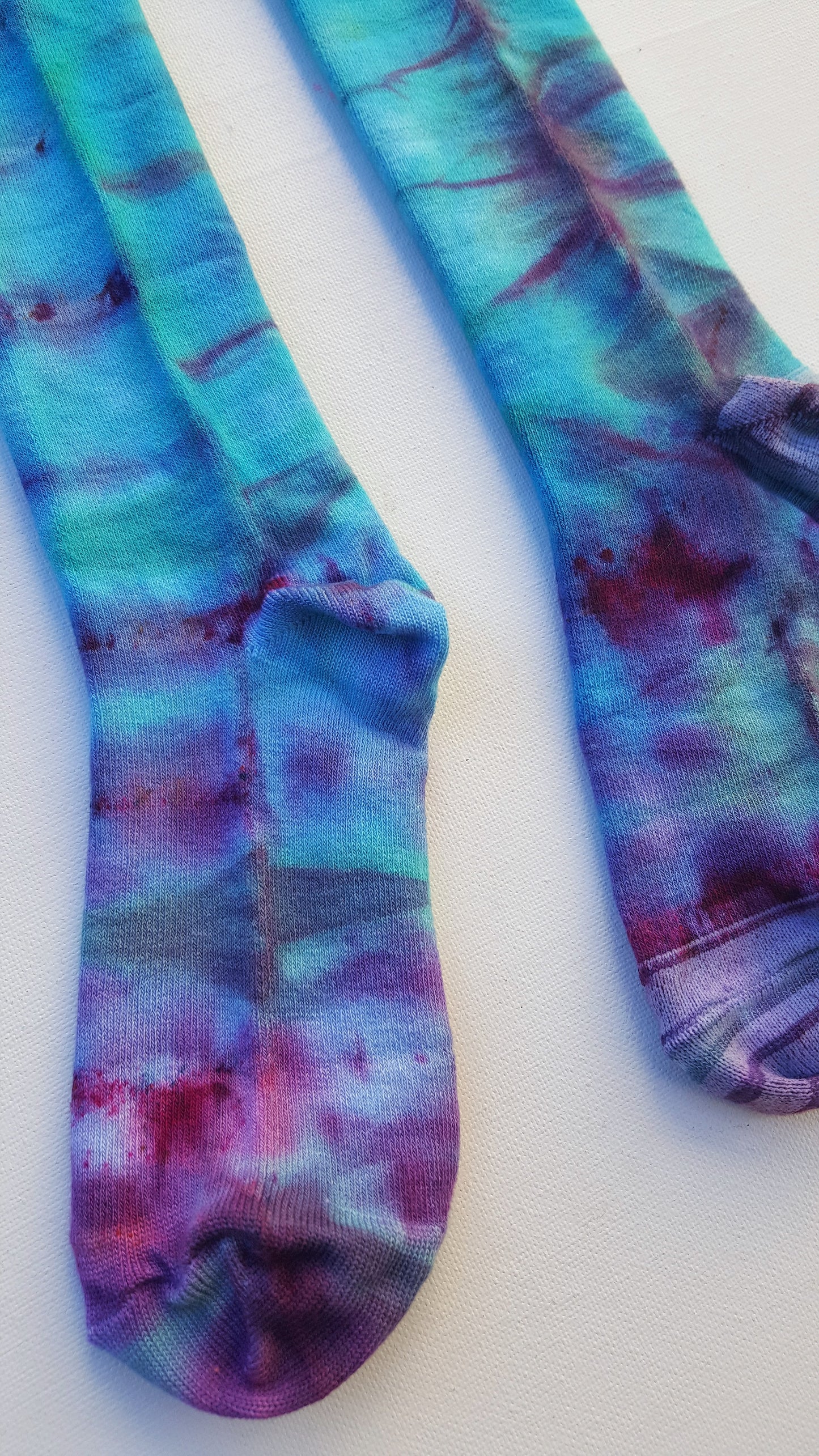 One pair of hand dyed bamboo knee high socks, in ice tie dye colours. Each is pair is unique and hand dyed with love, several colour options available.  Made with natural organic bamboo fibres, light and breathable. 80% bamboo, 17% polyamide, 3% elastane .  To fit women's size UK 4-8 - EUR 37-42 - US 6-10