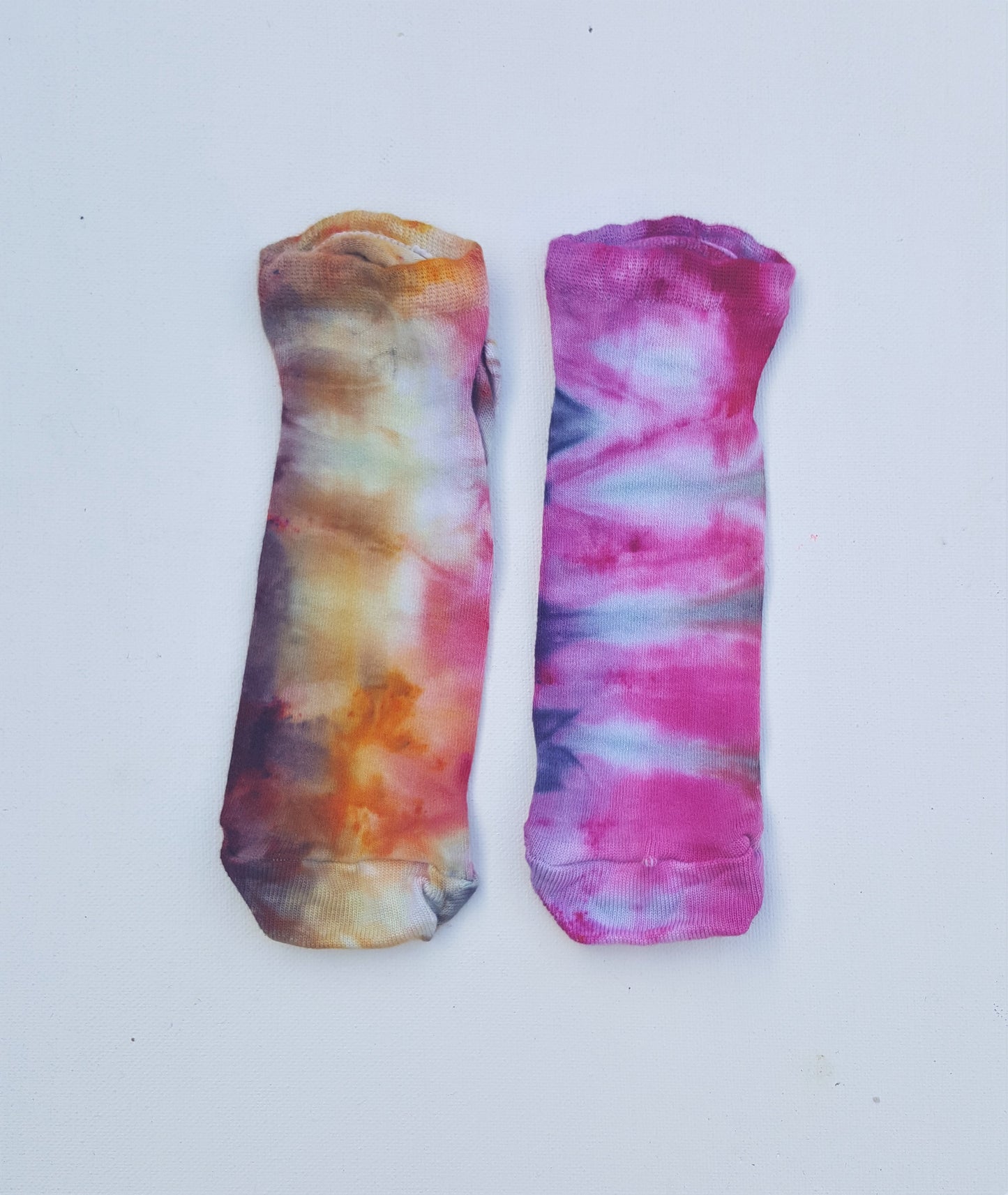 One pair of hand dyed bamboo trainer socks, in ice tie dye colours. Each is pair is unique and hand dyed with love, there's a huge variety of colours available and a pair will be chosen at random for you, each pair is unique and hand dyed!  Made with natural organic bamboo fibres, light and breathable. 80% bamboo, 17% polyamide, 3% elastane .  To fit women's size UK 4-8 - EUR 37-42 - US 6-10