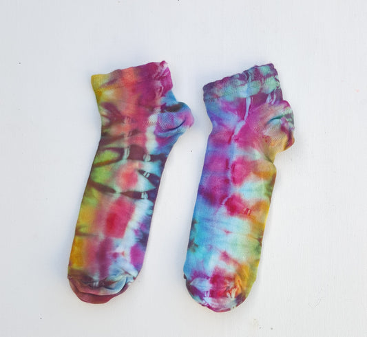 One pair of hand dyed bamboo trainer socks, in ice tie dye colours. Each is pair is unique and hand dyed with love, there's a huge variety of colours available and a pair will be chosen at random for you, each pair is unique and hand dyed!  Made with natural organic bamboo fibres, light and breathable. 80% bamboo, 17% polyamide, 3% elastane .  To fit women's size UK 4-8 - EUR 37-42 - US 6-10