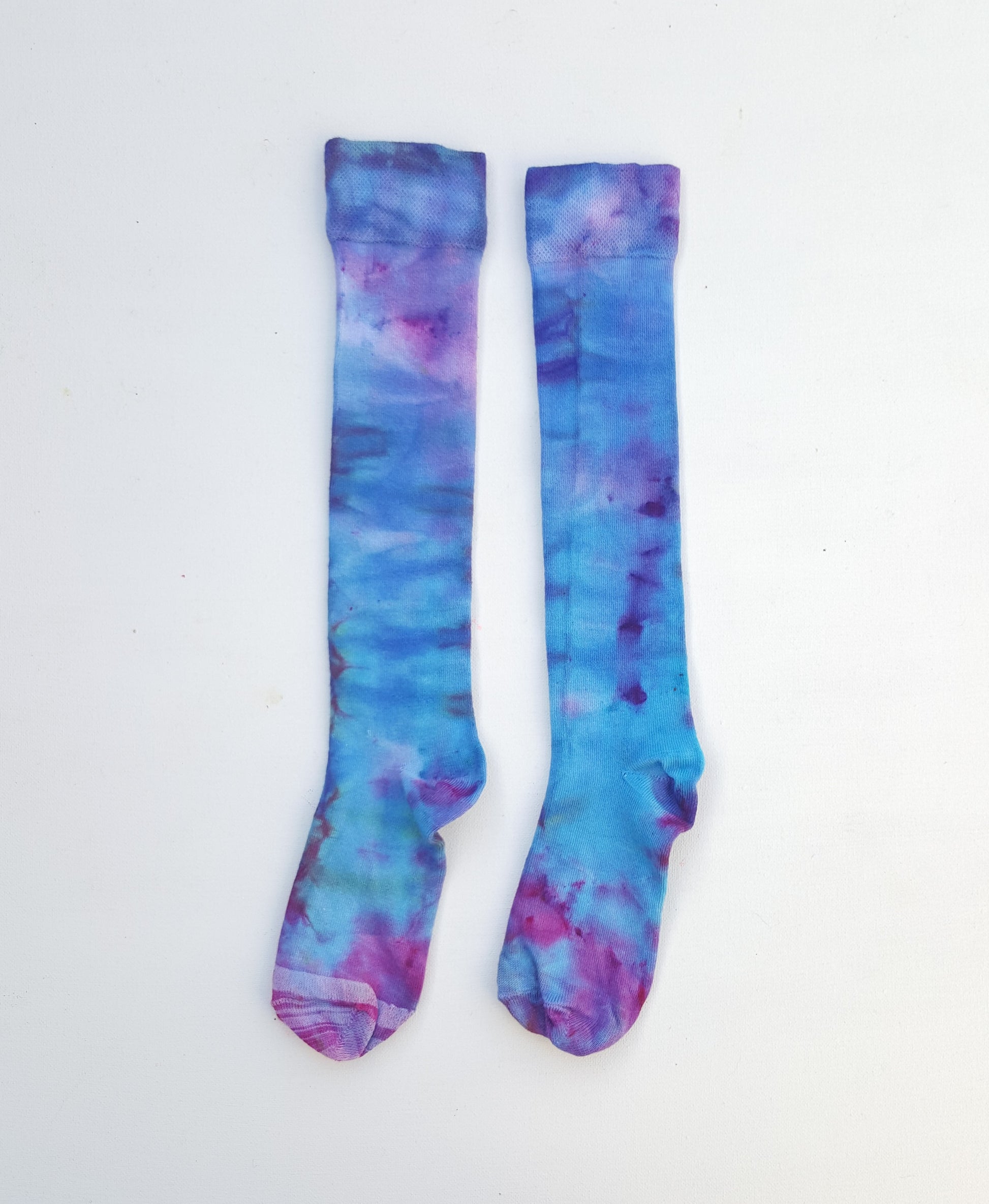 One pair of hand dyed bamboo knee high socks, in ice tie dye colours. Each is pair is unique and hand dyed with love, several colour options available.  Made with natural organic bamboo fibres, light and breathable. 80% bamboo, 17% polyamide, 3% elastane .  To fit women's size UK 4-8 - EUR 37-42 - US 6-10