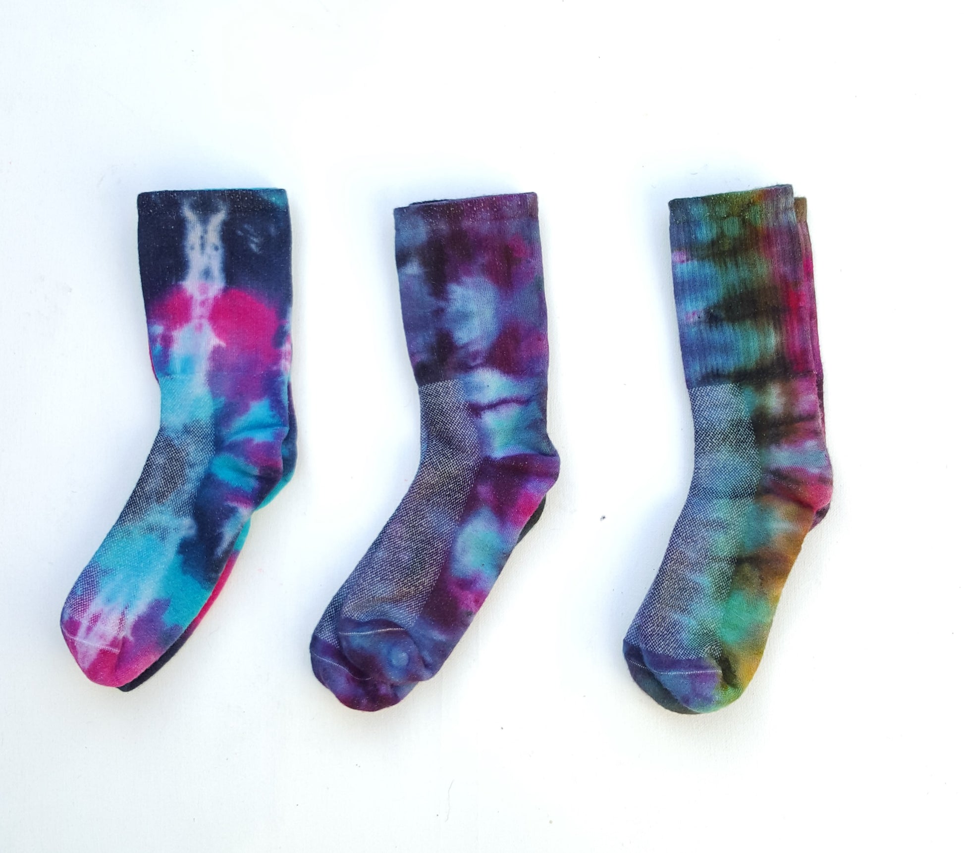 Gift set of x3 pairs of hand tie dyed bamboo sports socks.  Get hippy trippy every day of the week with these awesome unisex tie dye bamboo sports socks.  Socks are available in a mixture of colours and one will be chosen at random for your order. Each pair is hand dyed with love and is special and unique.  In 100% bamboo cotton, thick warm socks in stretchy breathable fabric.  To fit size UK 4-8 / 9-12  This listing is for 3 pairs of socks.  We only use recycled and compostable packaging!