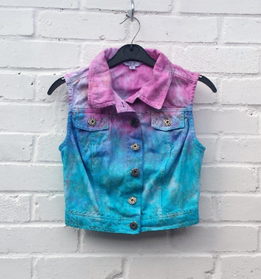 Upcycled denim waistcoat, in cropped style, in pastel pink & blue shades with rose print pattern throughout (see pics) to fit UK size 8 or US size 4. This beautiful one of a kind top was upcycled, so it's not just one of it's kind! It's also sustainable, ethical & friendly to the environment too! Hand dyed in the UK by AbiDashery.