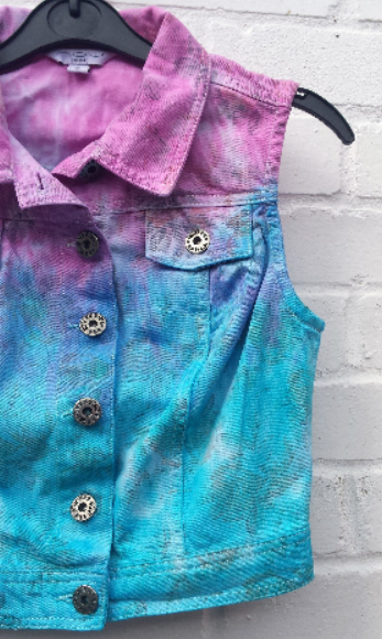 Upcycled denim waistcoat, in cropped style, in pastel pink & blue shades with rose print pattern throughout (see pics) to fit UK size 8 or US size 4. This beautiful one of a kind top was upcycled, so it's not just one of it's kind! It's also sustainable, ethical & friendly to the environment too! Hand dyed in the UK by AbiDashery.